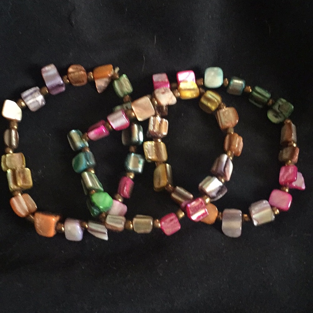 Set of three multi colored stone bracelets